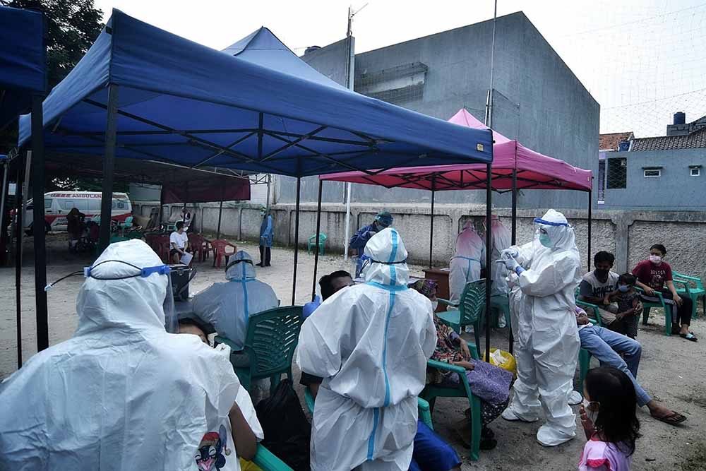 Tes Usap PCR di Kawasan Zona Merah Covid-19