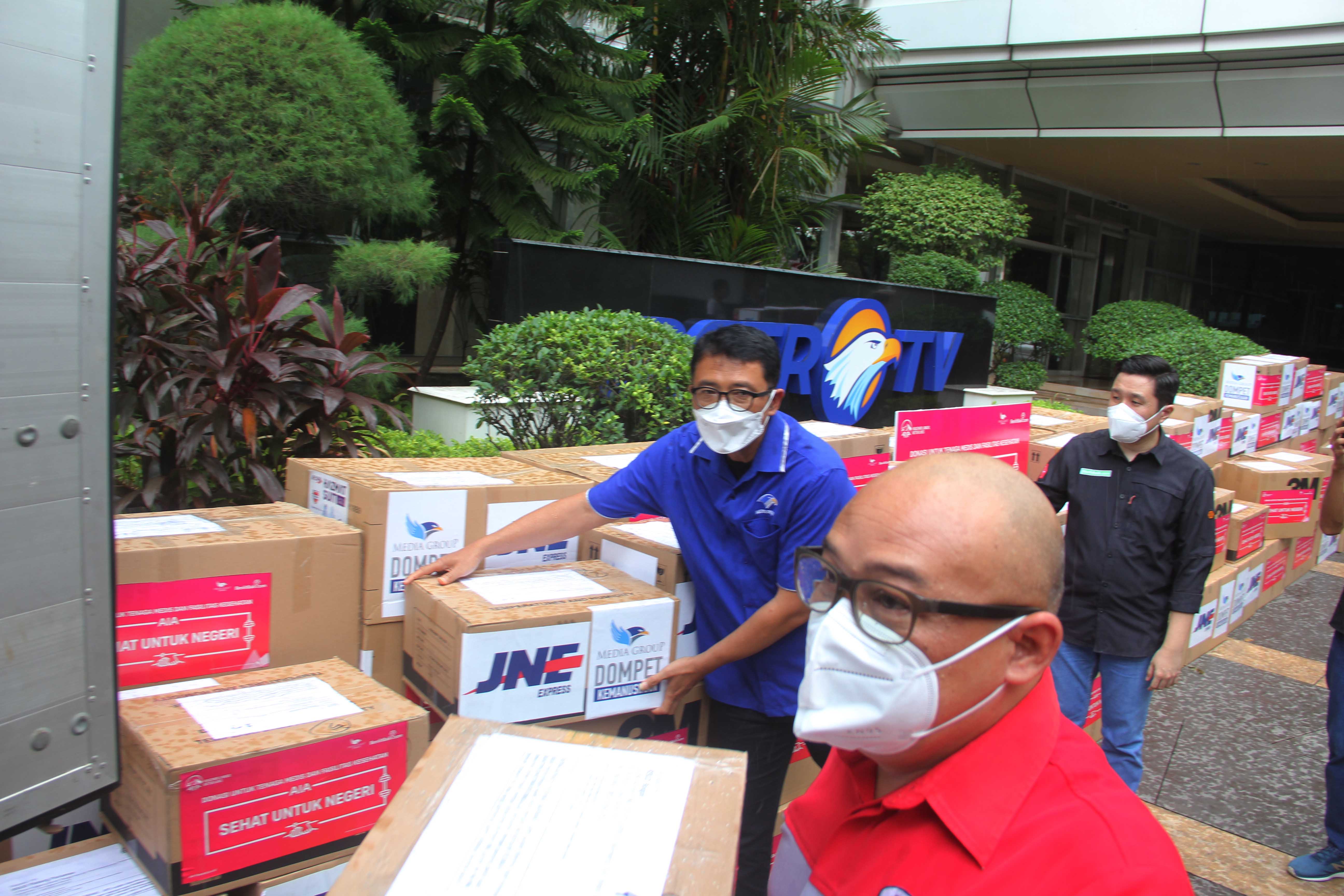 Dompet Kemanusiaan Media Group Salurkan Bantuan AIA