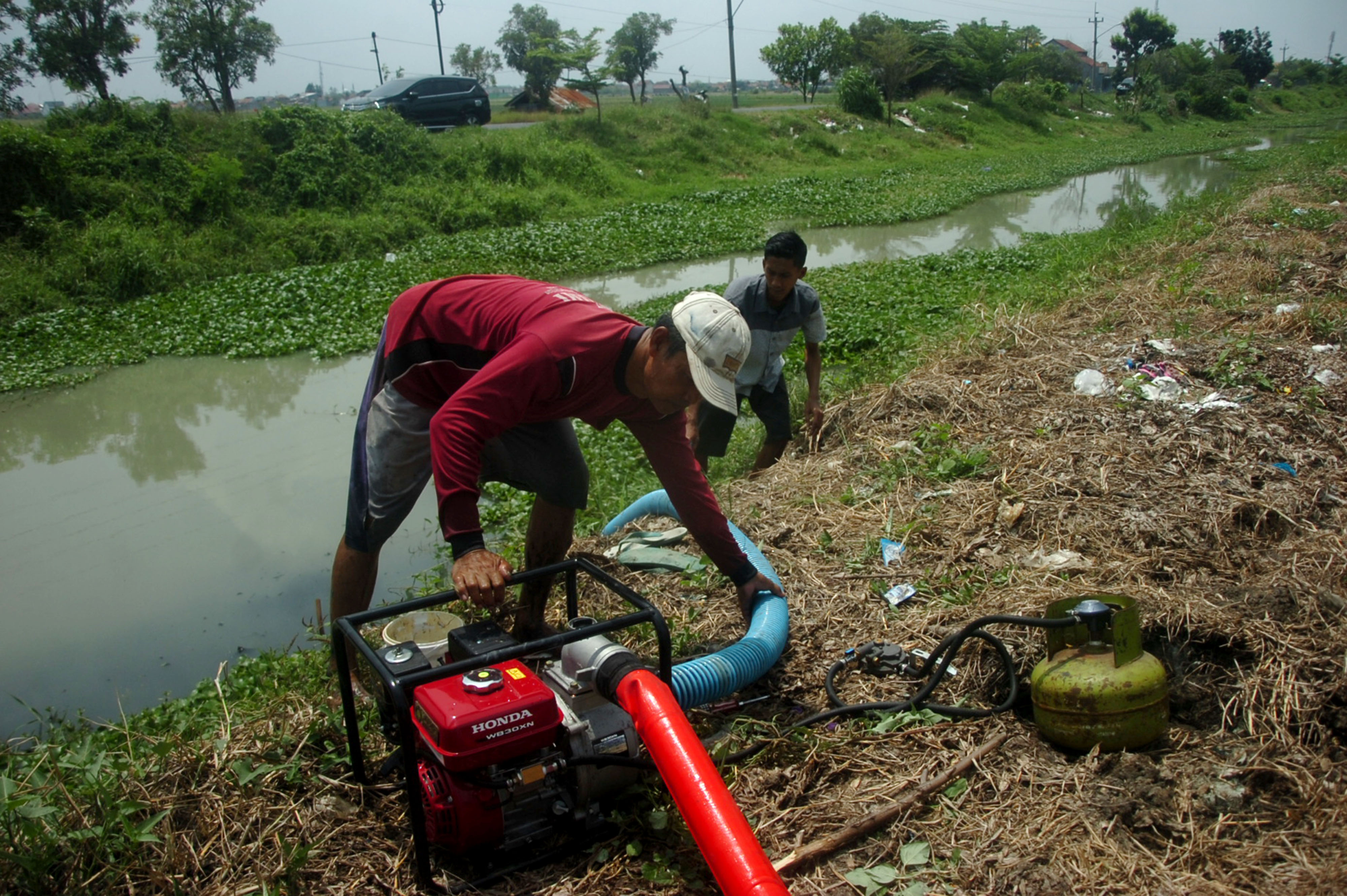 Modifikasi Mesin Pompa Air Menggunakan Elpiji